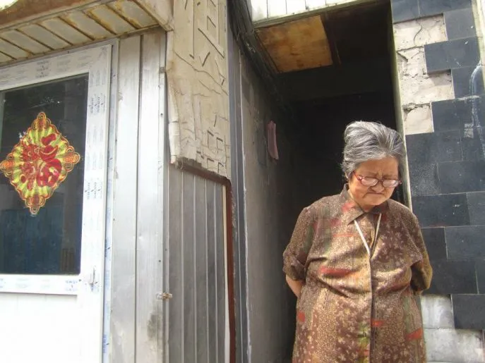 Vrouw in volksbuurt in Xi'an